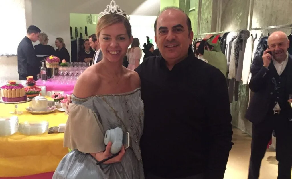 Sami Bazzi with fashion model at children's fashion showroom event