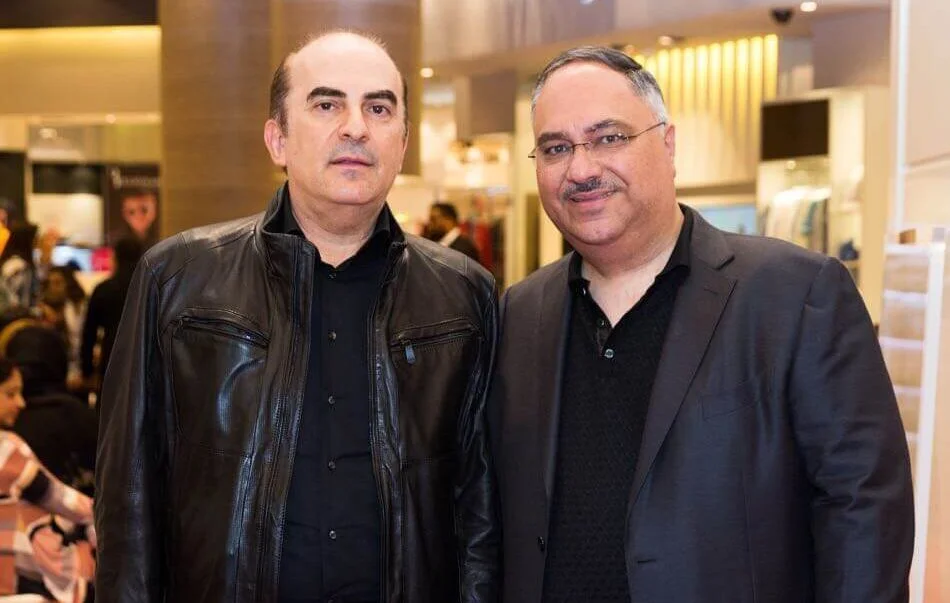 Sami Bazzi posing with colleague at professional event